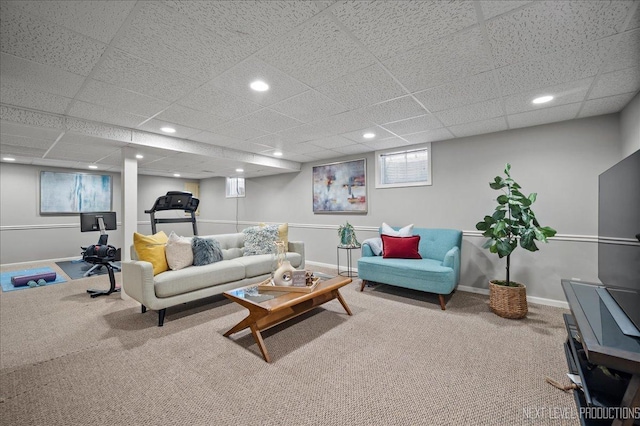 living room with carpet floors, recessed lighting, and baseboards