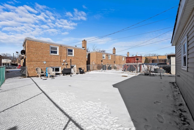 view of yard featuring a residential view and fence