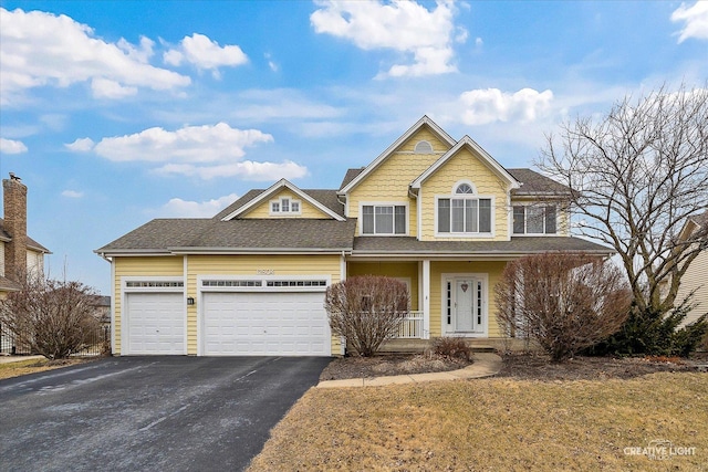 view of front of home with aphalt driveway, an attached garage, a porch, and a shingled roof