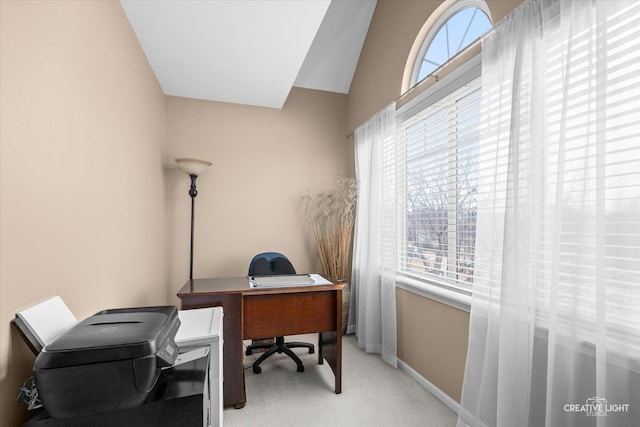 office featuring baseboards, carpet, and vaulted ceiling