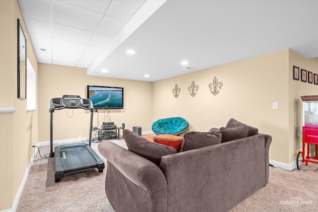 living area featuring visible vents, recessed lighting, baseboards, carpet flooring, and a paneled ceiling