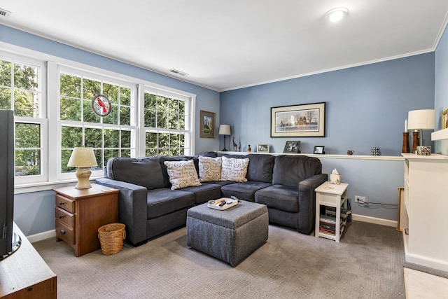 carpeted living room with ornamental molding, visible vents, and baseboards