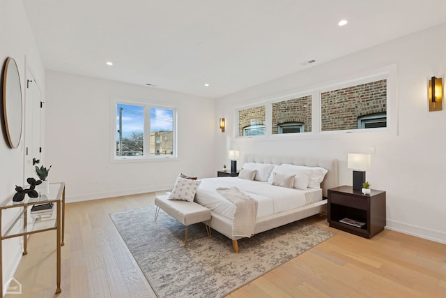 bedroom featuring light wood-type flooring