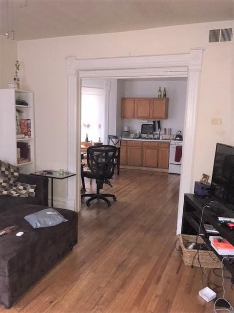 living room with hardwood / wood-style floors