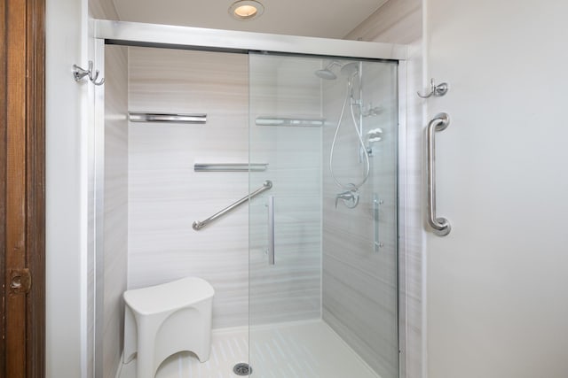 bathroom with a stall shower