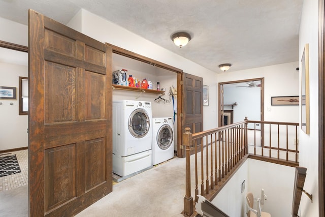 laundry room featuring a ceiling fan, laundry area, and washing machine and clothes dryer