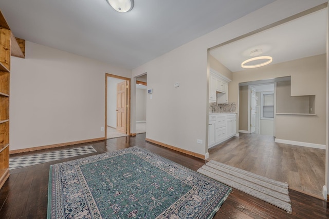 interior space with dark wood-type flooring