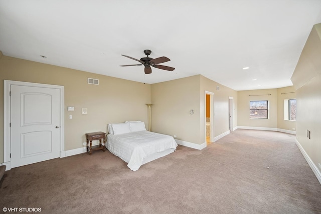 unfurnished bedroom featuring carpet, visible vents, and baseboards