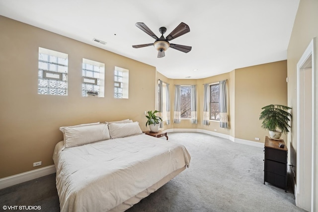 bedroom featuring carpet floors, baseboards, and visible vents