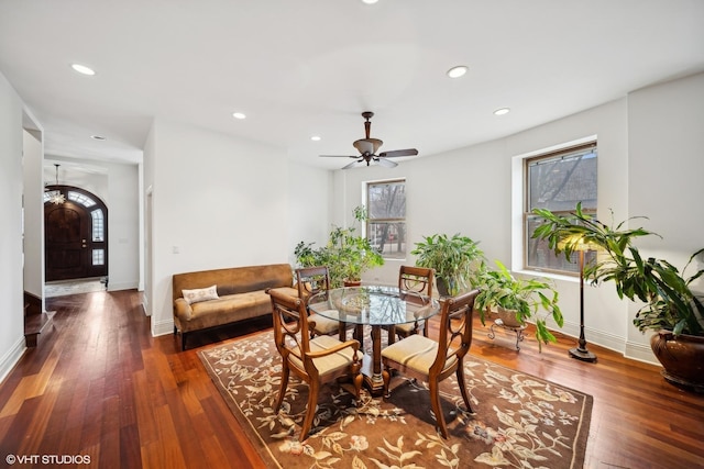 dining area with recessed lighting, dark wood finished floors, and baseboards