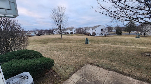 view of yard with central AC