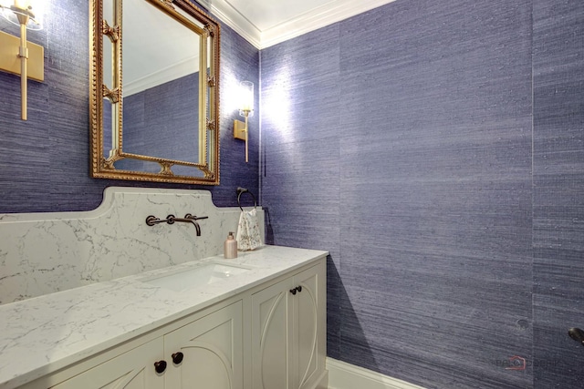 bathroom featuring vanity, tasteful backsplash, and ornamental molding