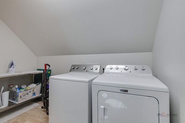 laundry area featuring washer and clothes dryer and laundry area