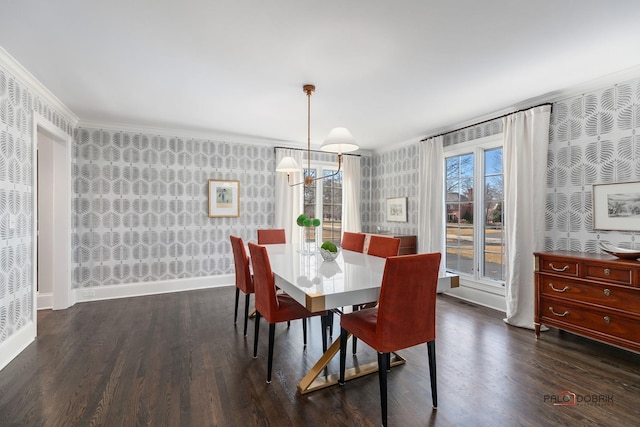 dining space featuring wallpapered walls, crown molding, wood finished floors, and baseboards