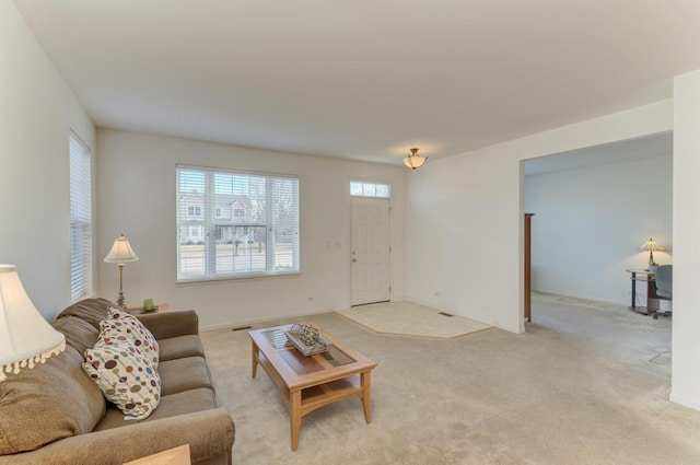 living room with light carpet