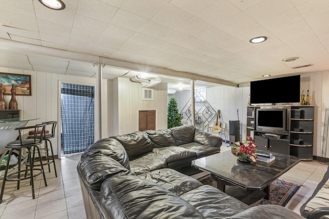 living room featuring light tile patterned floors