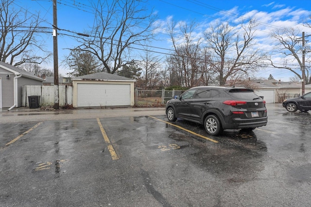 view of parking with a garage