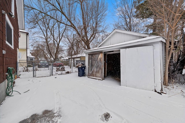 view of snow covered garage