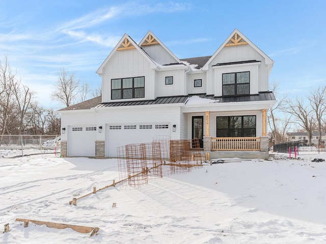 modern farmhouse style home with a garage