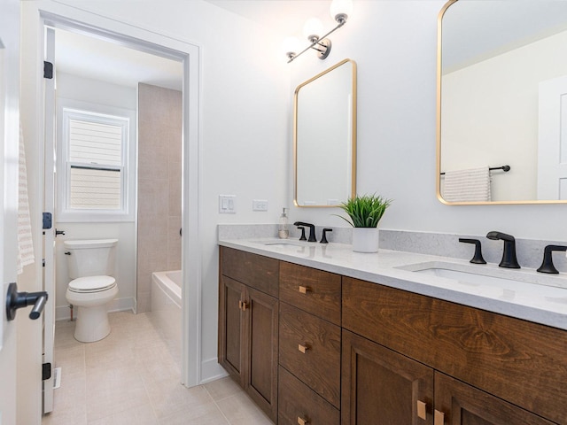 full bathroom featuring bathing tub / shower combination, vanity, and toilet