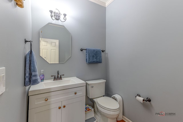 half bath featuring toilet and vanity