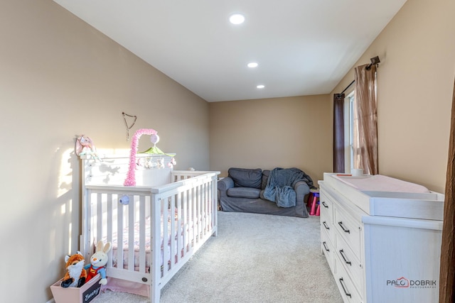 bedroom featuring recessed lighting and light colored carpet