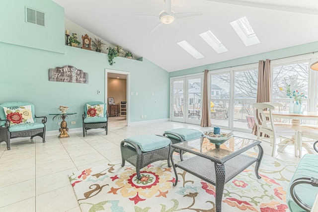 living room featuring ceiling fan, baseboards, visible vents, and a healthy amount of sunlight