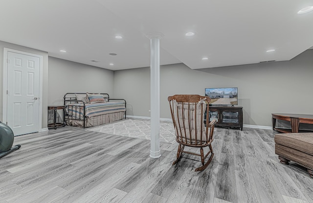 bedroom featuring recessed lighting, light wood-type flooring, visible vents, and baseboards