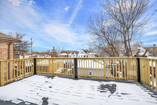 view of snow covered deck