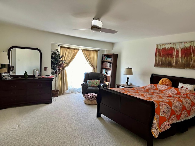 bedroom featuring ceiling fan and light colored carpet