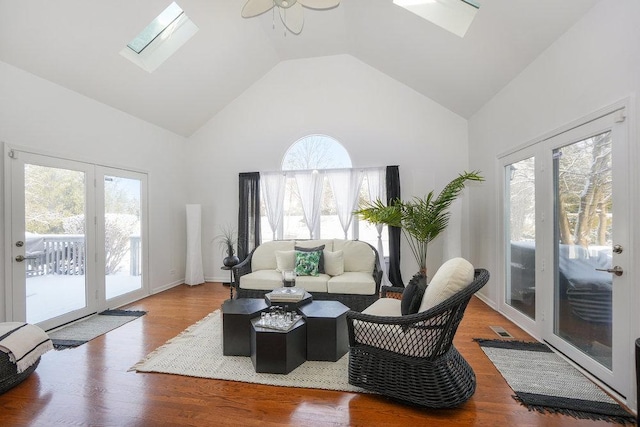 3642 Monarch Cir, Naperville, IL 60564 - living room with a skylight, visible vents, wood finished floors, and high vaulted ceiling