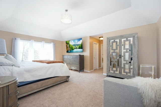 3642 Monarch Cir, Naperville, IL 60564 - bedroom featuring a tray ceiling, light colored carpet, baseboards, and lofted ceiling