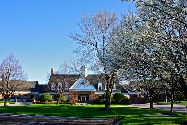 3642 Monarch Cir, Naperville, IL 60564 - tudor house with a front lawn and stone siding