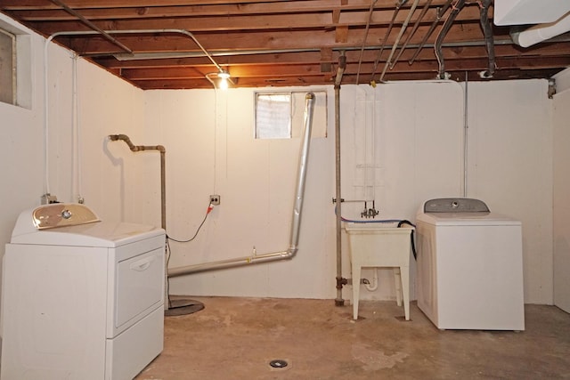 laundry area with laundry area and washing machine and dryer