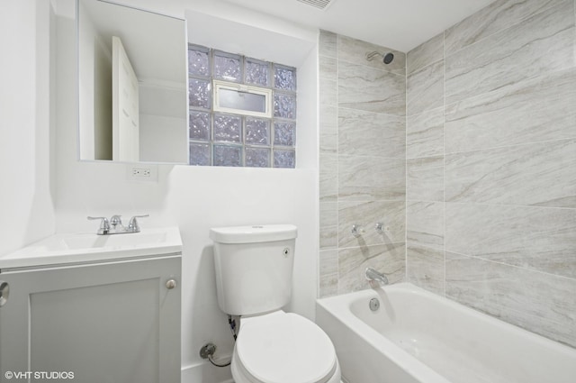 full bathroom with bathing tub / shower combination, vanity, and toilet