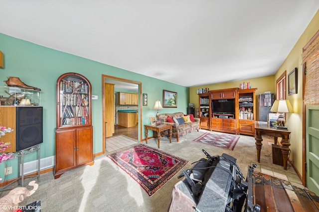 living room featuring light carpet