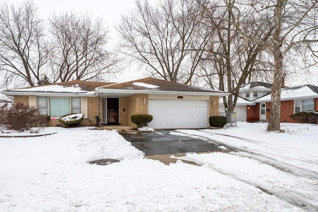 ranch-style house featuring a garage