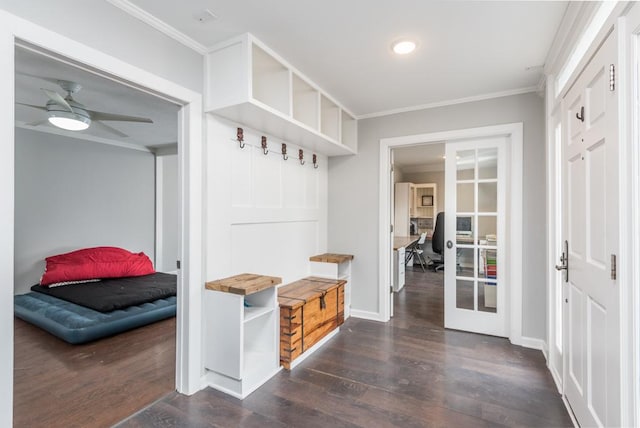 mudroom featuring dark wood-type flooring, a ceiling fan, baseboards, french doors, and crown molding