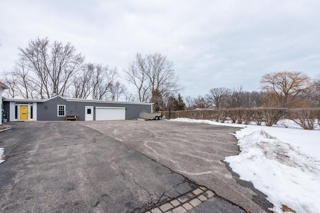 exterior space with a garage and driveway