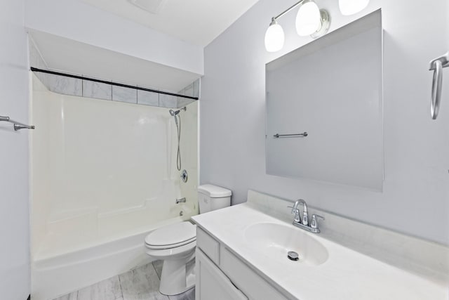 full bath featuring toilet, washtub / shower combination, visible vents, and vanity