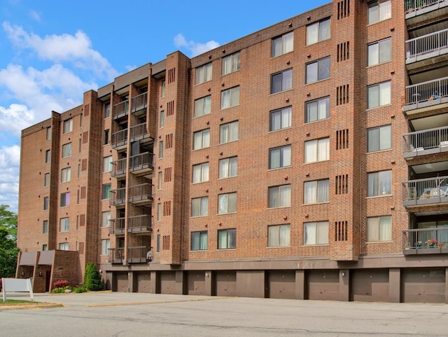 view of property featuring community garages