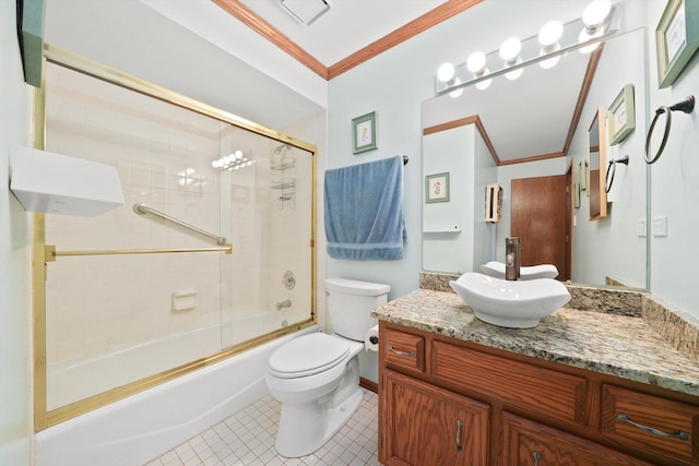 full bathroom featuring tile patterned flooring, toilet, bath / shower combo with glass door, vanity, and ornamental molding