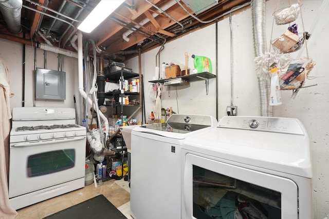 clothes washing area with laundry area, washing machine and dryer, and electric panel