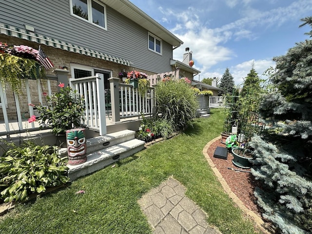 view of yard with a deck