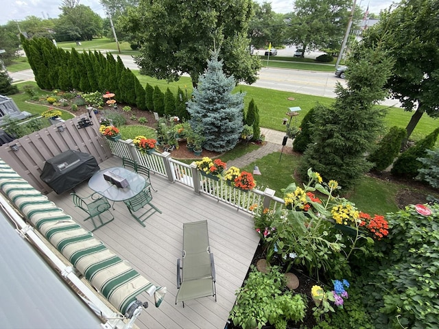 wooden deck featuring grilling area