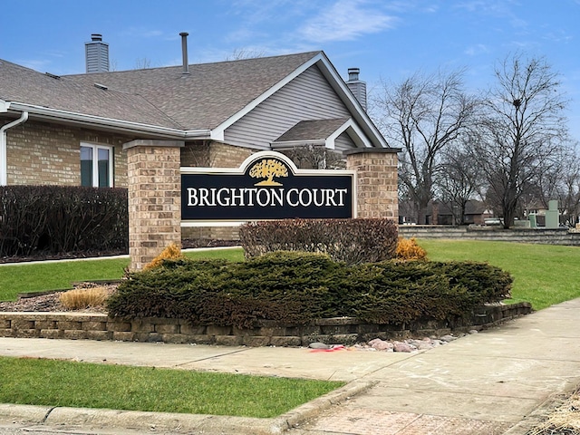 view of community sign