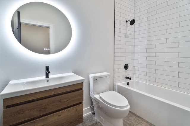 full bathroom featuring toilet, vanity, and tiled shower / bath