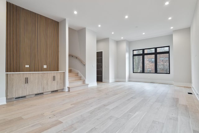 unfurnished room featuring light hardwood / wood-style flooring