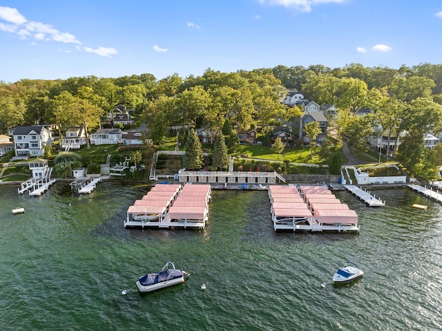 dock area with a water view and a residential view