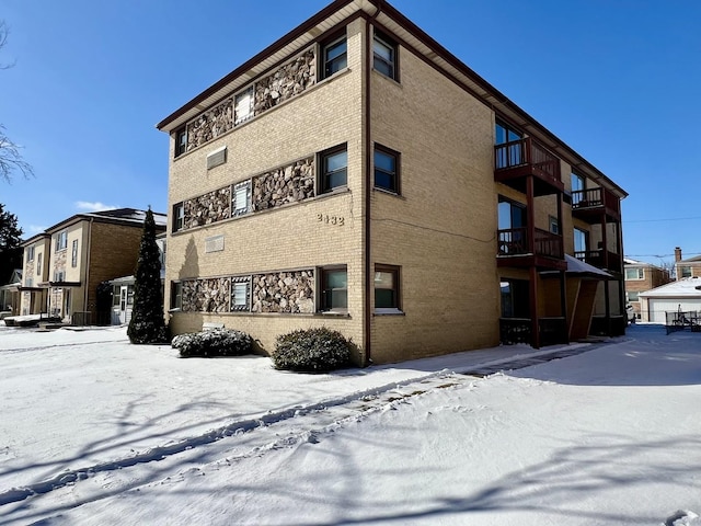 view of snow covered property